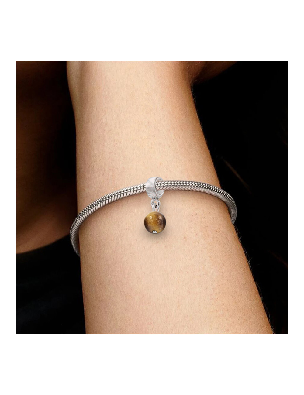Fetiche para pulsera/collar elaborado con Ojo de Tigre natural y plata de primera ley. Fetiche para pulsera/collar elaborado con Ojo de Tigre natural y plata de primera ley.