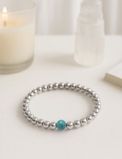 Pulseras bolas de plata y...