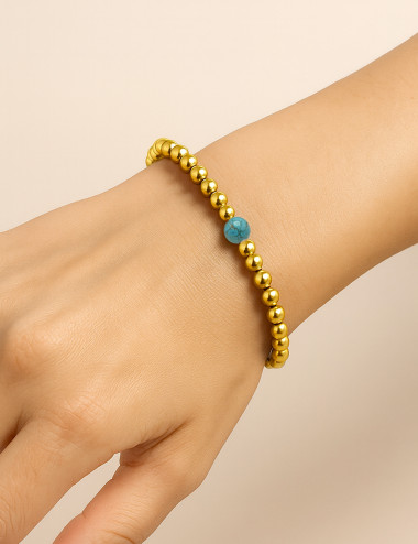 Pulseras bolas de plata...