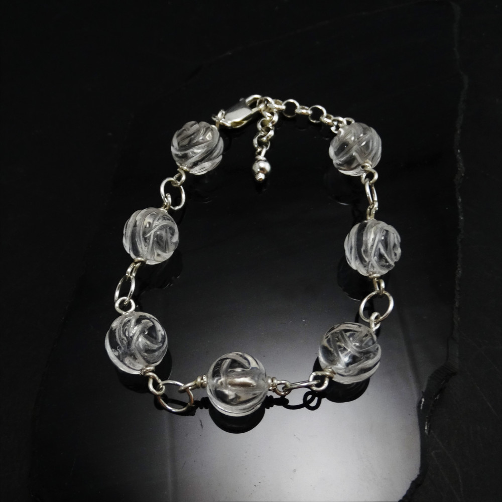 Pulsera de cuarzo cristal de roca tallado y plata de 1ª ley