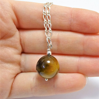 Conjunto ojo de tigre y plata 925 mm